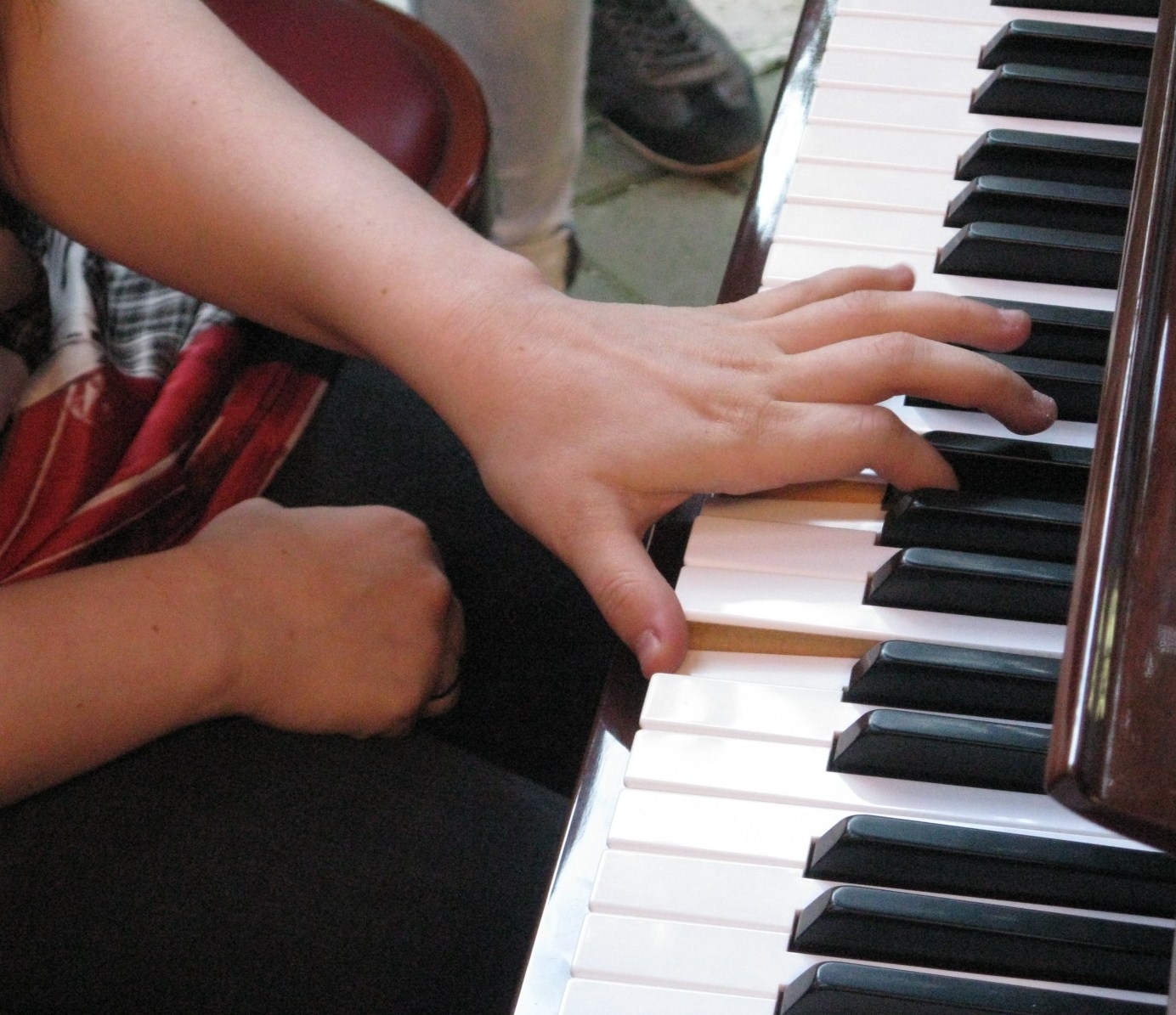 Mani sul pianoforte